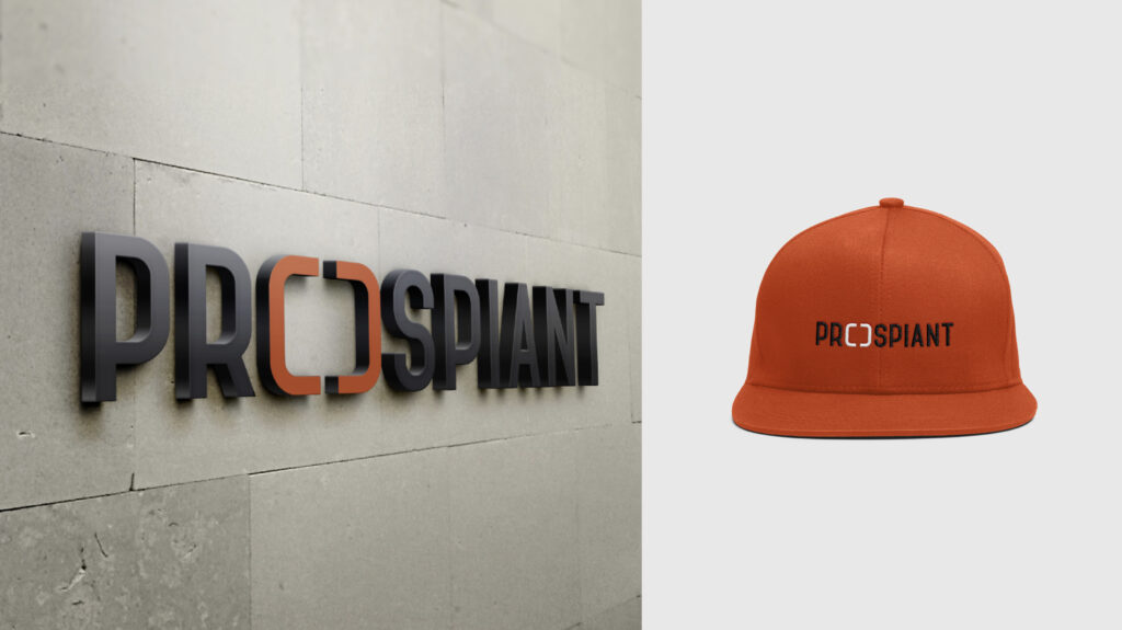 Company name and logo on wall and hat